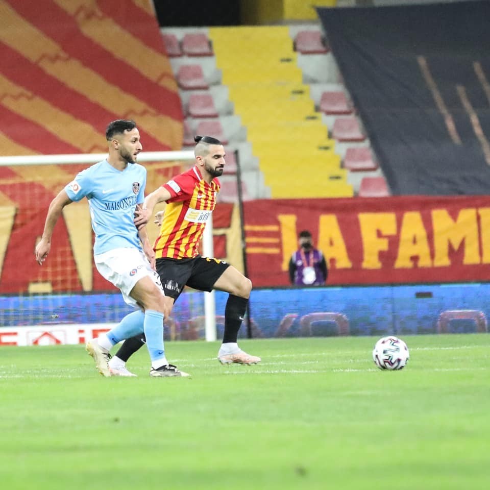 #21 Aziz Eraltay Behich